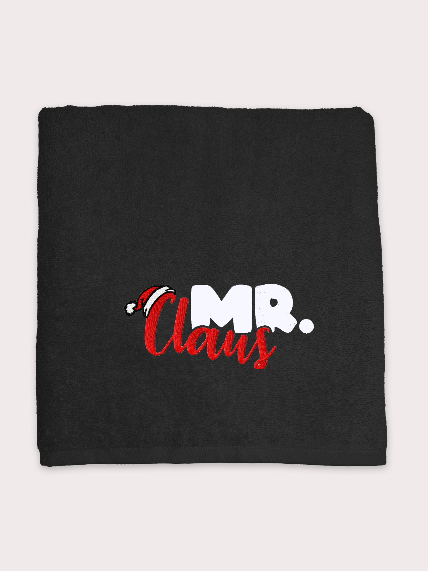 Mr. Claus törölköző egy névvel hímezve